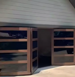 Load image into Gallery viewer, Folding Sectional Garage Door

